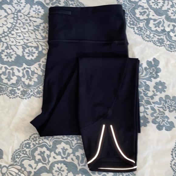 ATHLETA 22” Crop Training/running leggings with night reflective detailing trim. - Picture 1 of 12